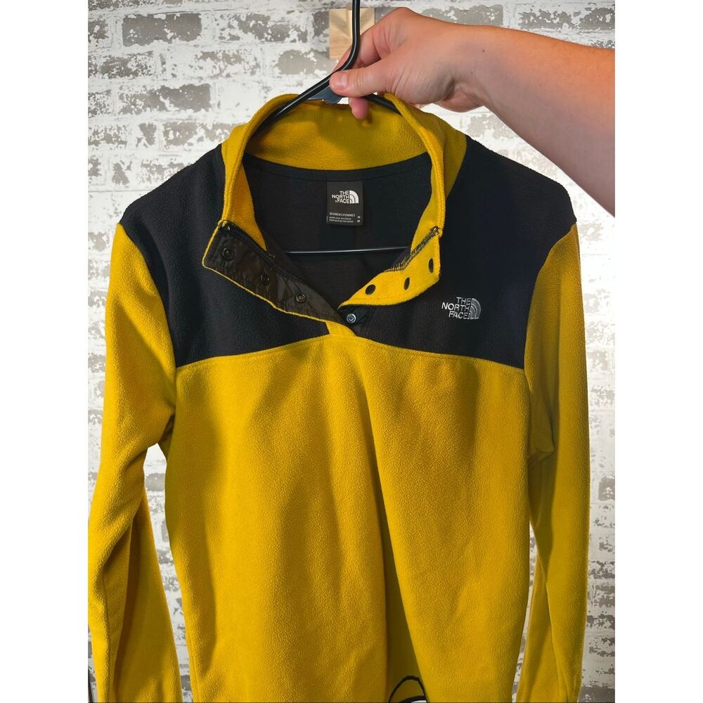 The North Face | women yellow and black 1/4 snap pullover